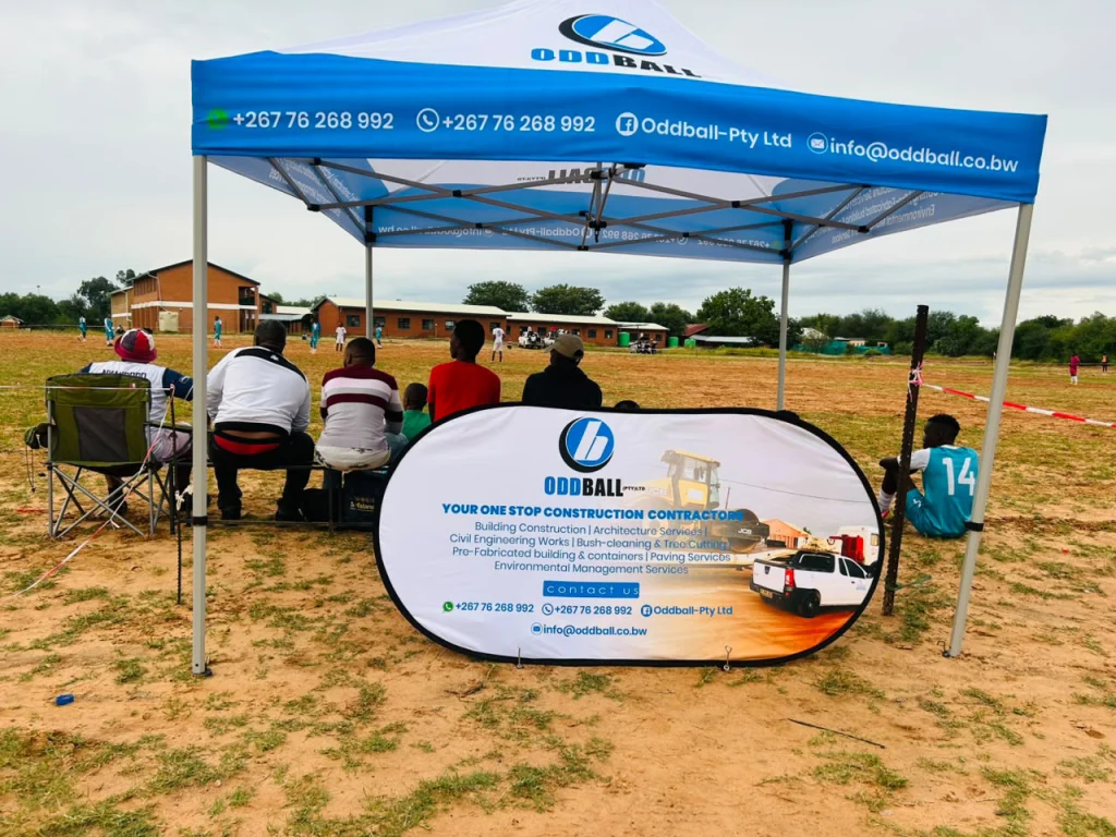 OddBall branded marquee at a community event