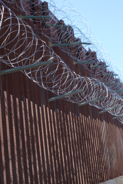 Razor wire coil on a security fence