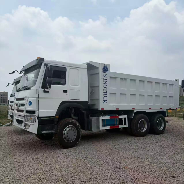 Tipper trucks loaded with material on an OddBall site